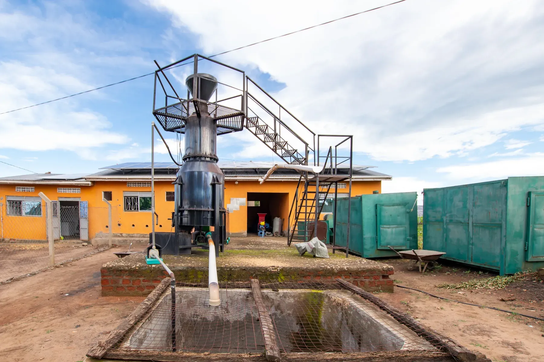 The gasifier, control building and settling tanks seen across the Got Ngur compound